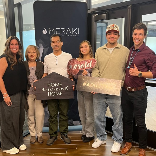 Closing day photo with clients