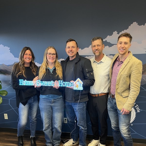 Closing day photo with clients